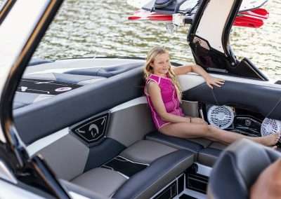 Young girl relaxing in a luxurious boat