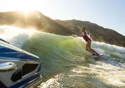 Professional athlete performing tricks while wakeboarding in Orlando