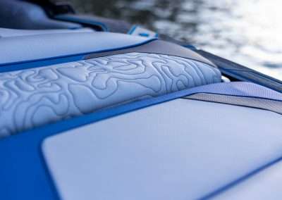 Close-up of blue and gray boat seats